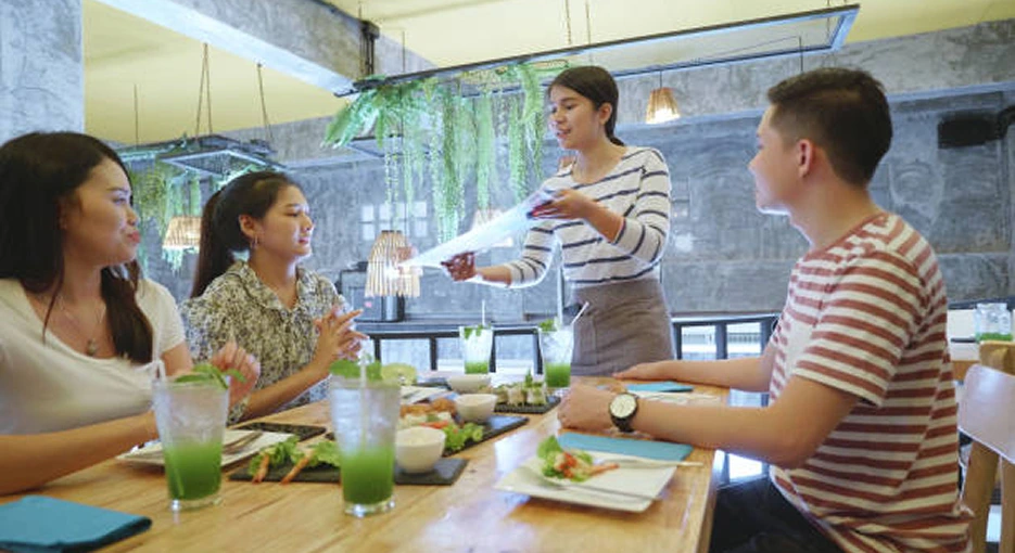 illustrate people are ordering Vietnamese dishes
